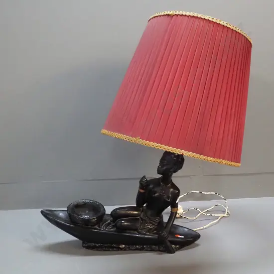 retro black painted figural table lamp - woman in canoe. With pleated shade. H-700 L-480