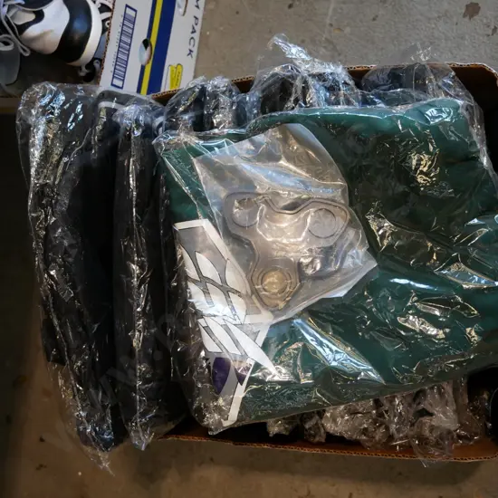 box of assorted unopened costumes