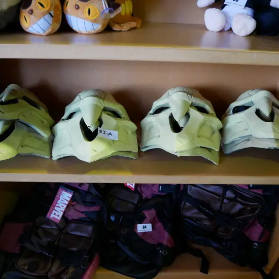 shelf of Overwatch Reaper masks