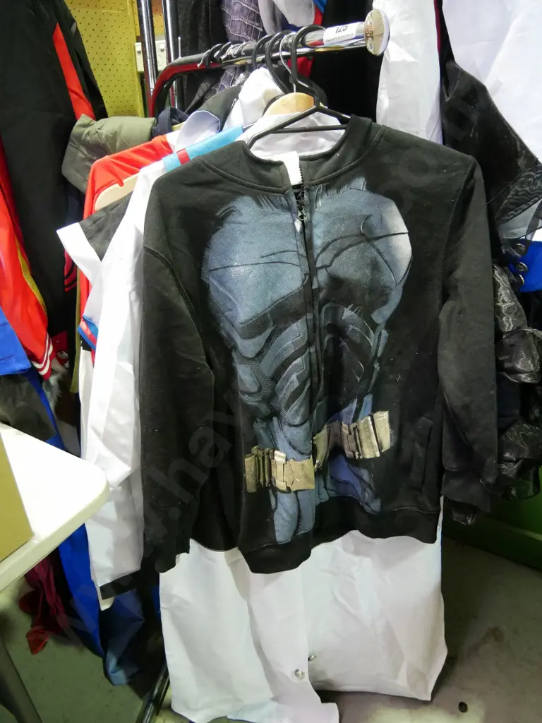 rack of assorted costumes Image 1++