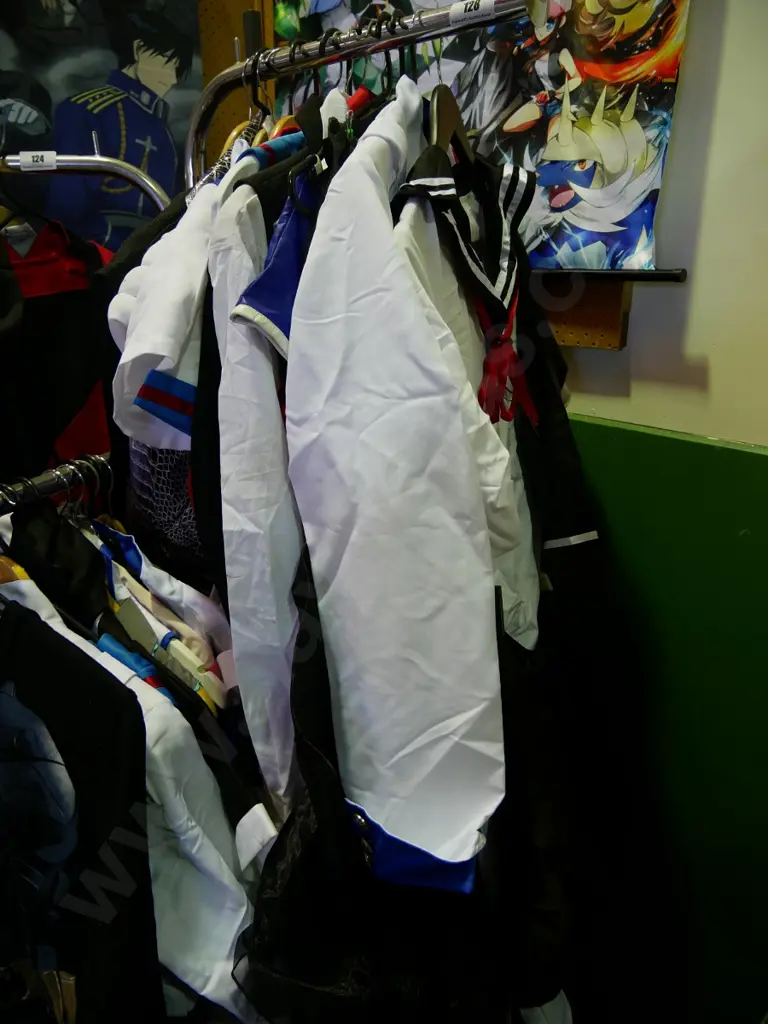 rack of assorted costumes Image 1++