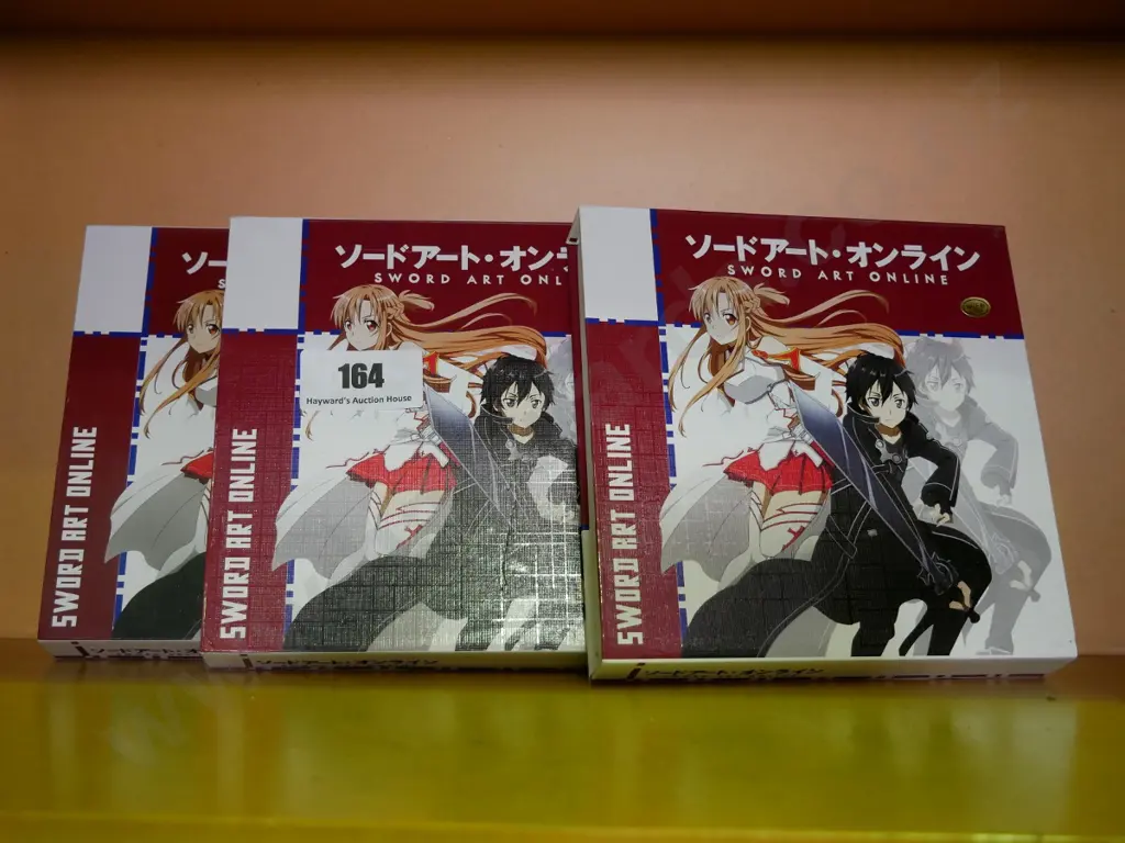 3 boxes Sword Art Online miniature swords Image 1++