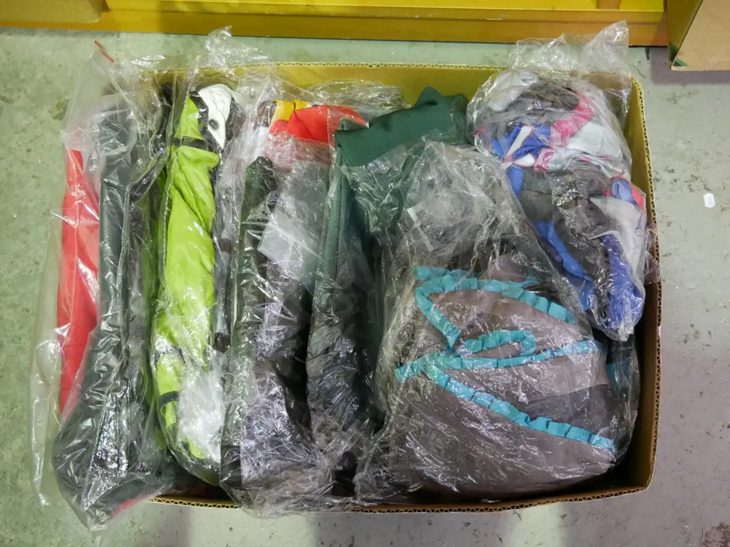 box of unopened costumes Image 1++