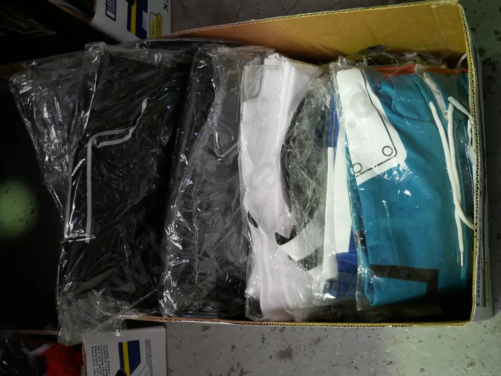 box of unopened costumes Image 1++