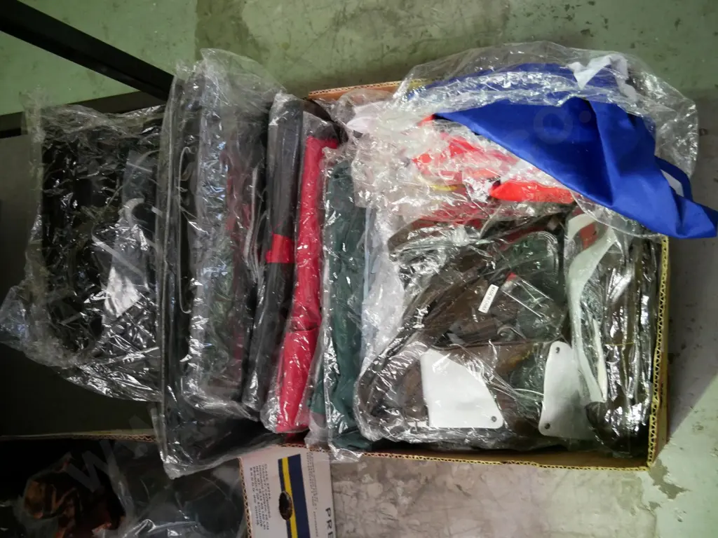 box of unopened costumes Image 1++