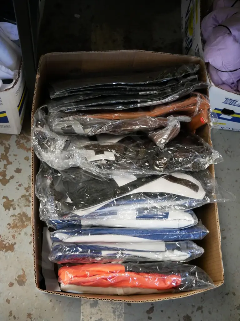 box of unopened costumes Image 1++