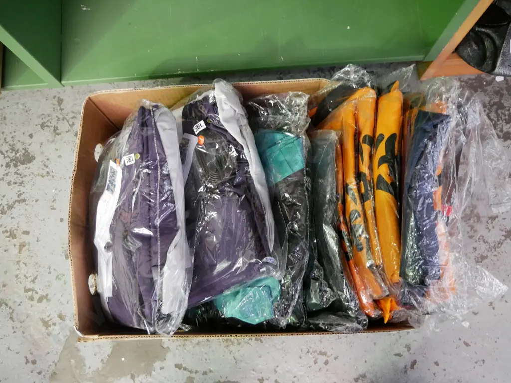 box of unopened costumes Image 1++