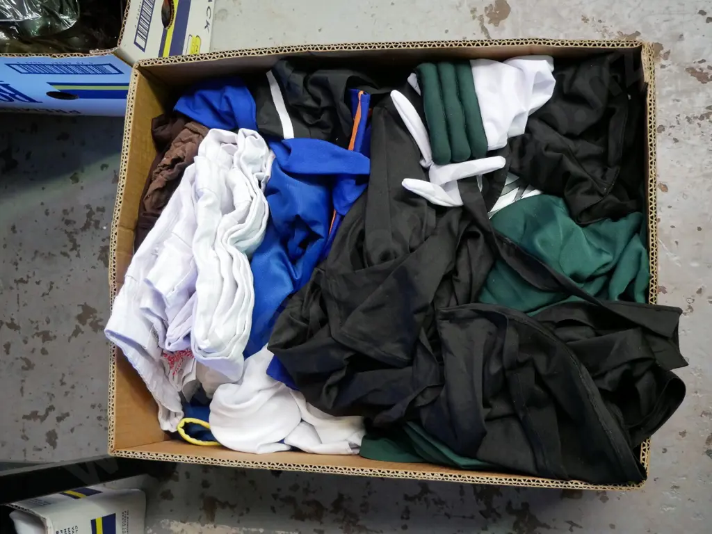 box of opened costumes Image 1++