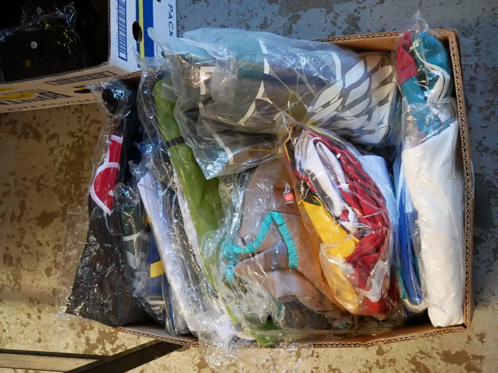box of unopened costumes Image 1++
