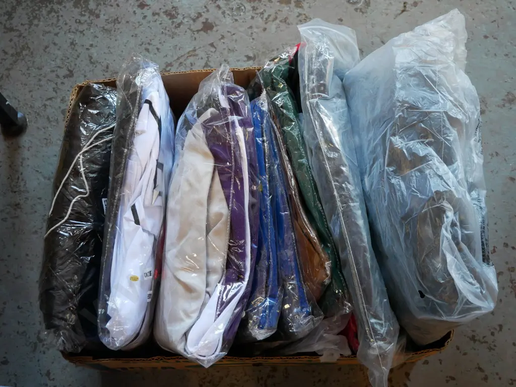 box of unopened costumes Image 1++