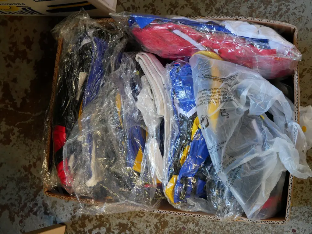 box of unopened costumes Image 1++