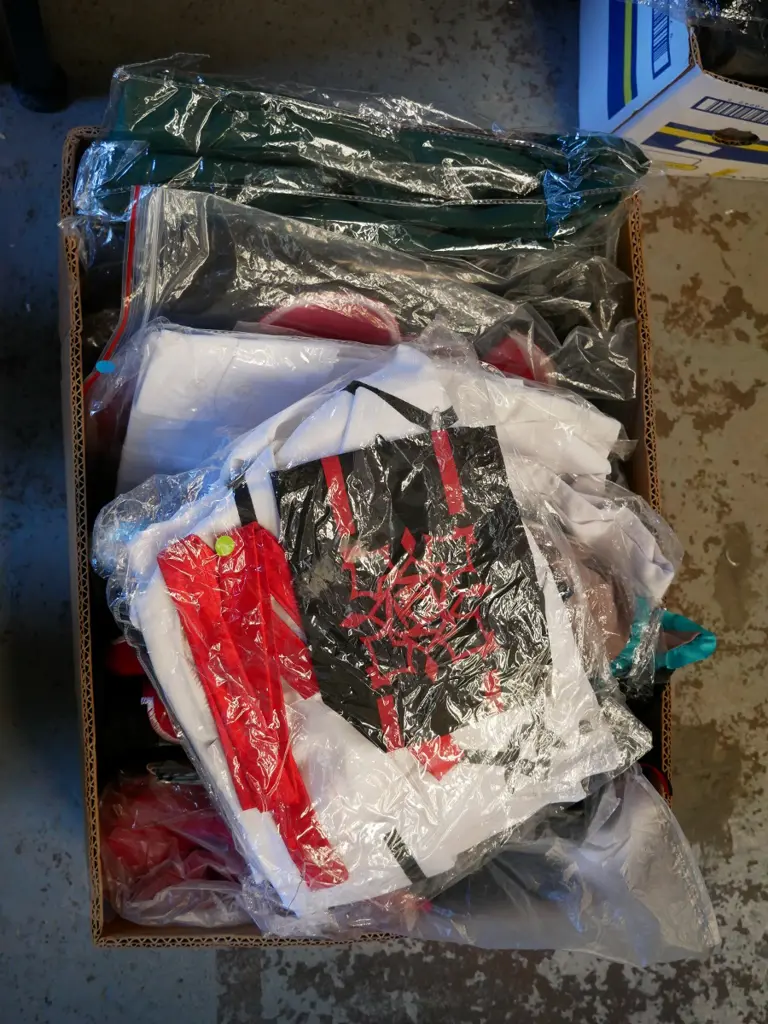 box of unopened costumes Image 1++