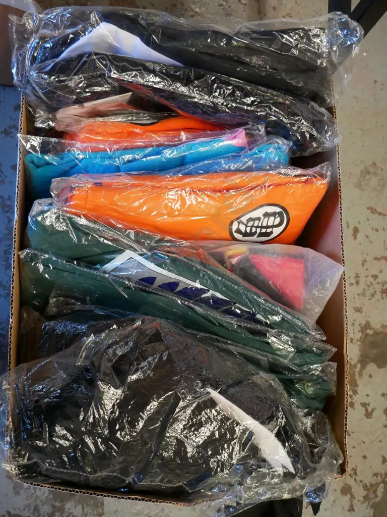 box of unopened costumes Image 1++