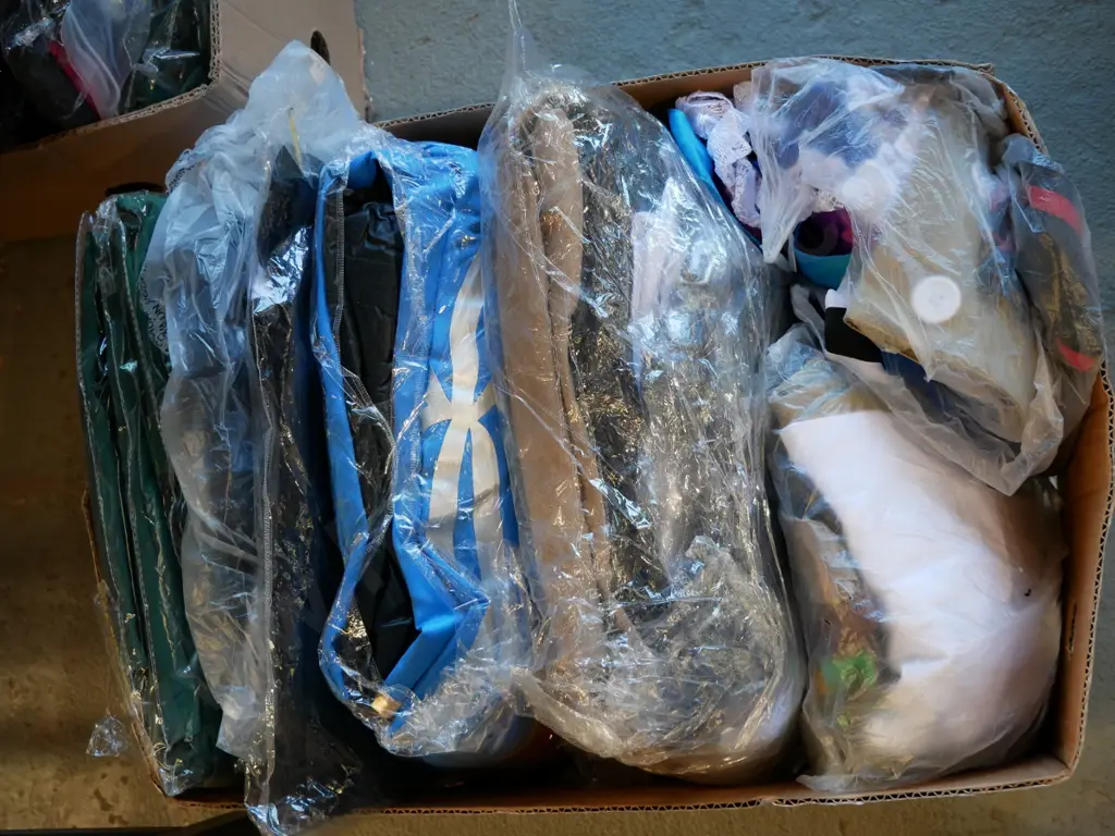 box of unopened costumes Image 1++