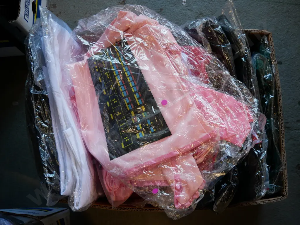box of unopened costumes Image 1++