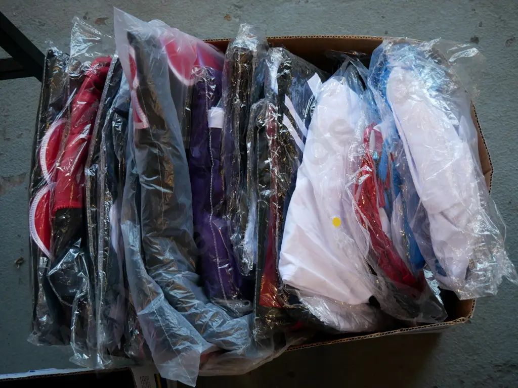 box of unopened costumes Image 1++