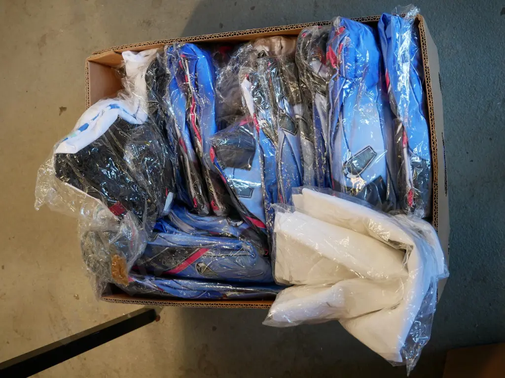 box of unopened costumes Image 1++