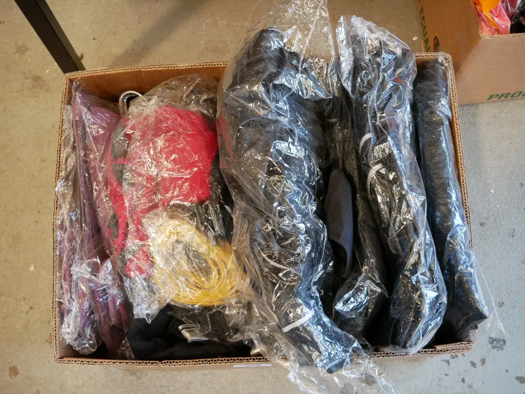 box of unopened costumes Image 1++