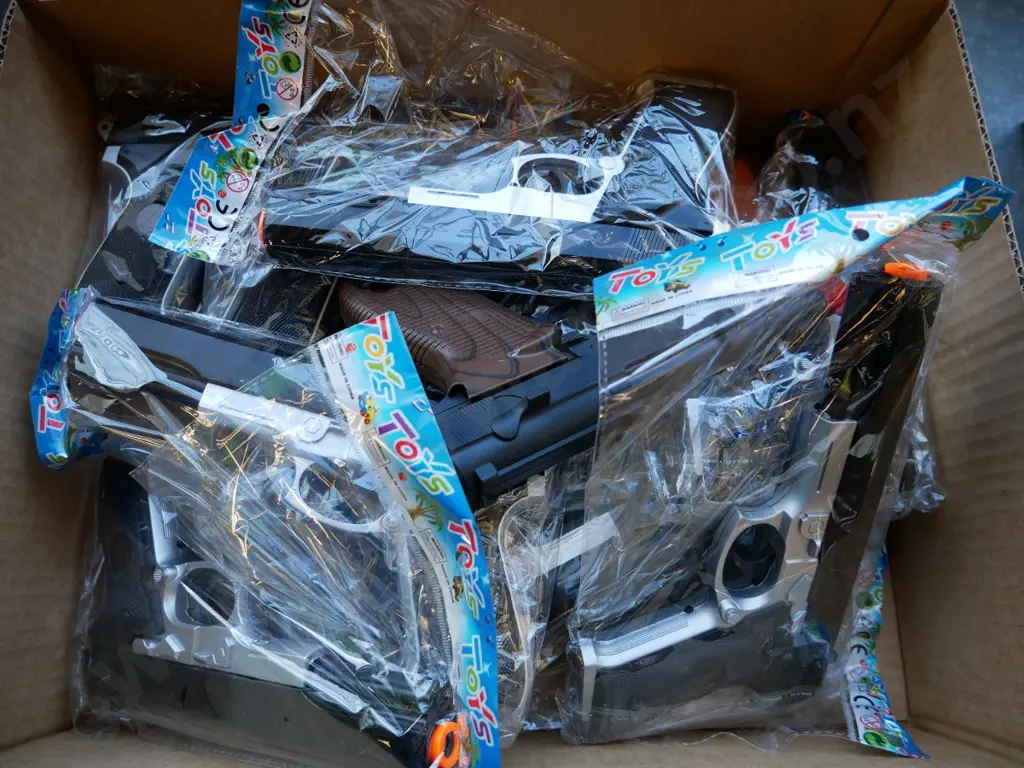 box of plastic handguns Image 1++