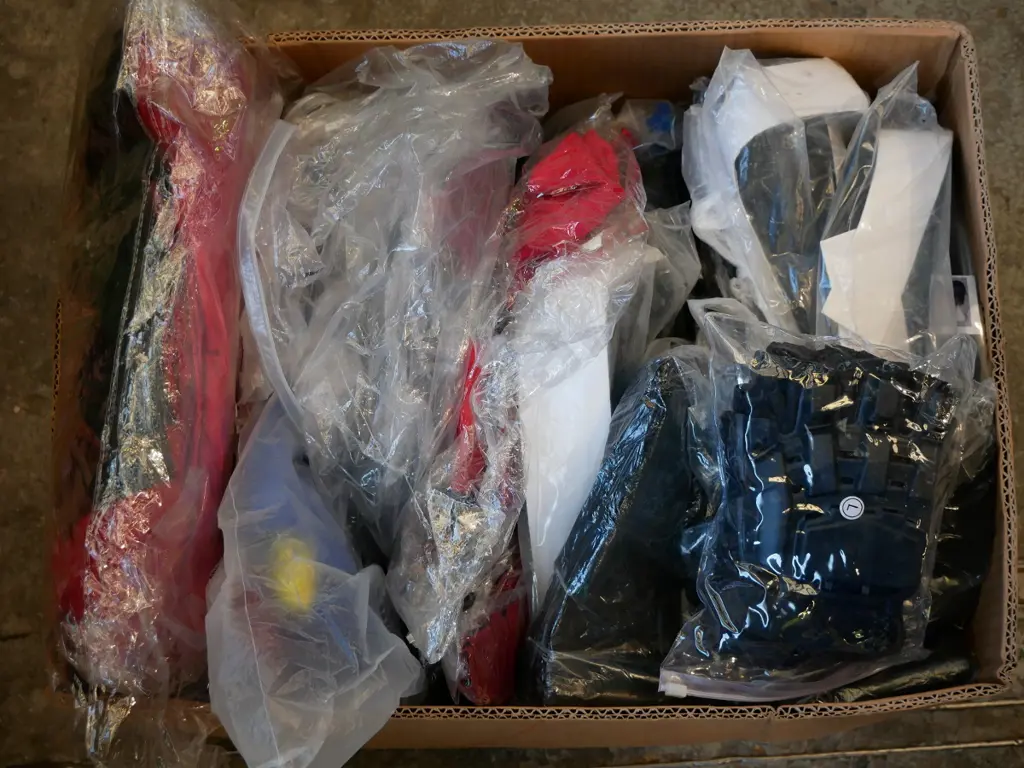 box of unopened costumes Image 1++