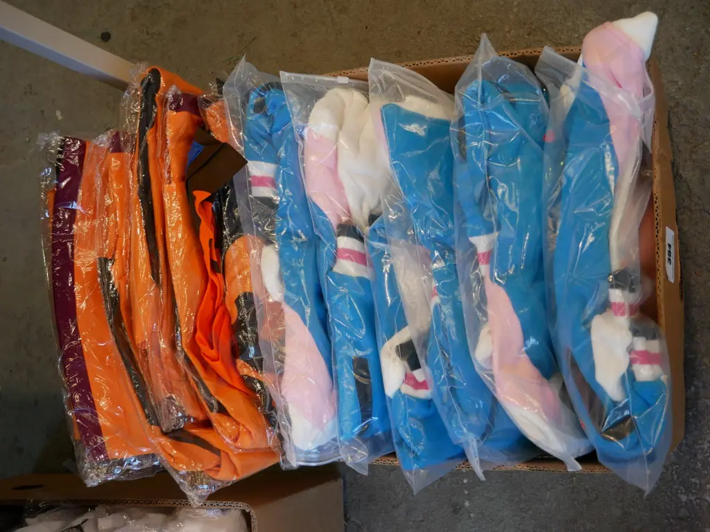 box of unopened costumes Image 1++