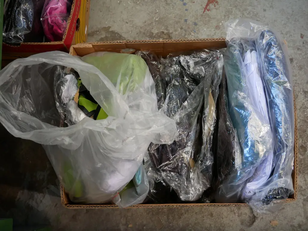 box of unopened costumes Image 1++