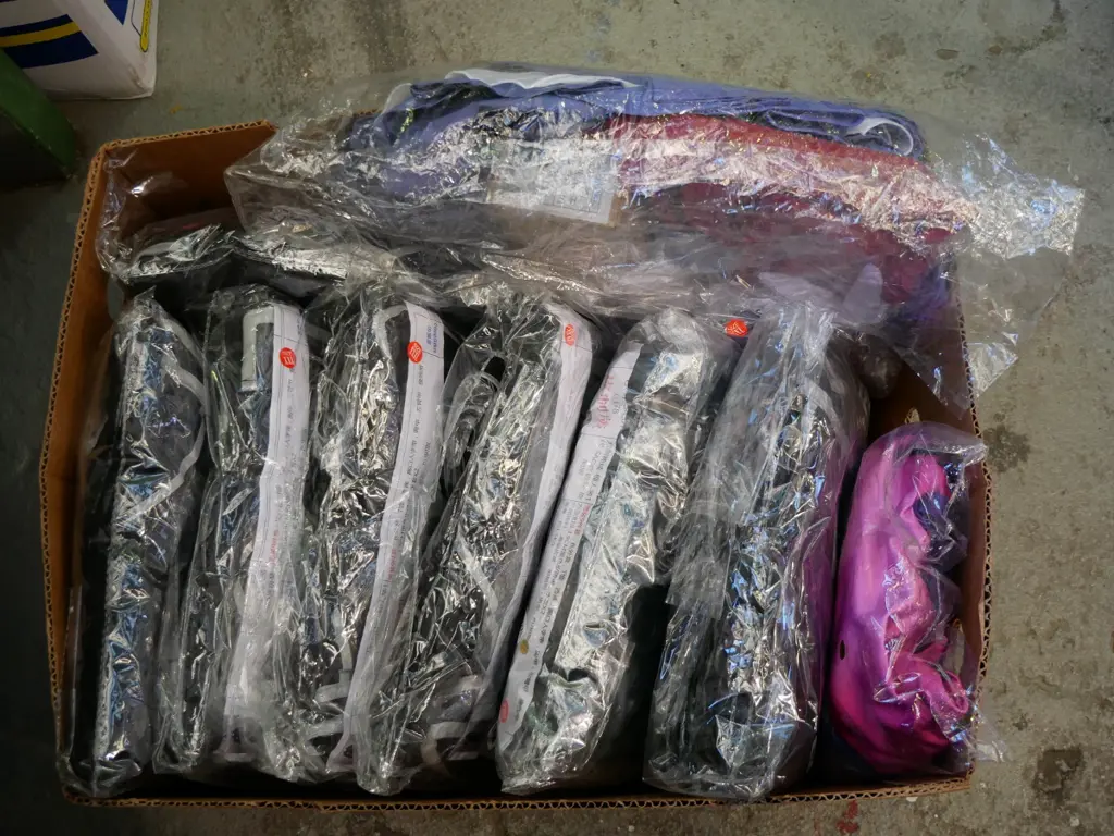 box of unopened costumes Image 1++