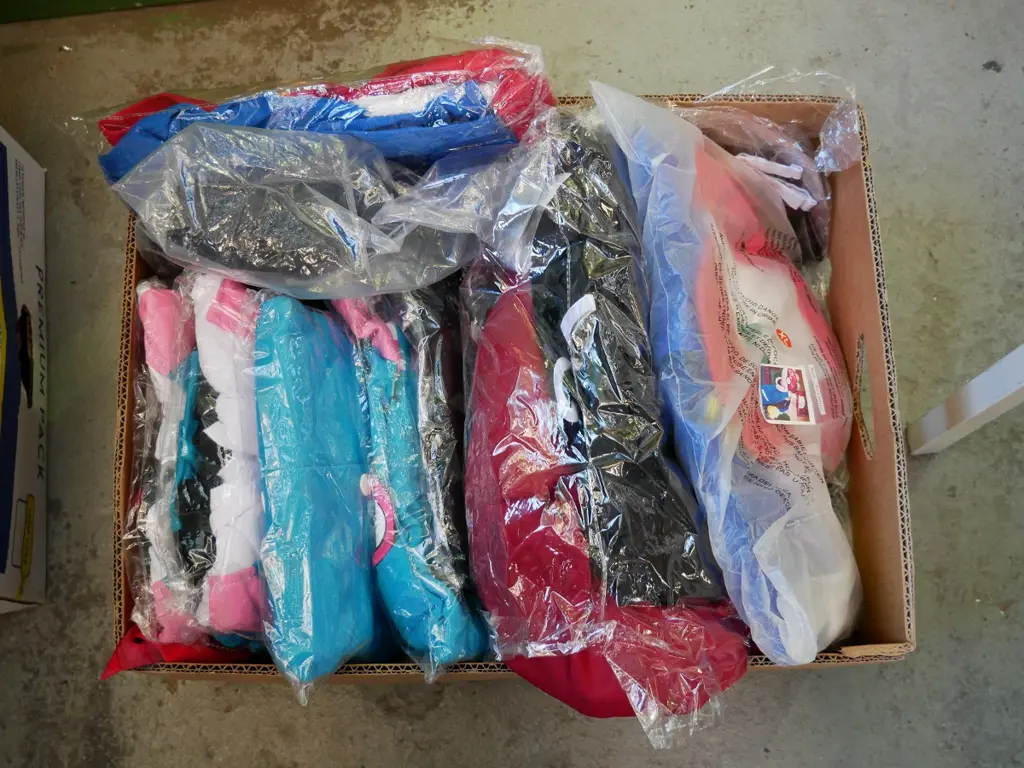 box of unopened costumes Image 1++