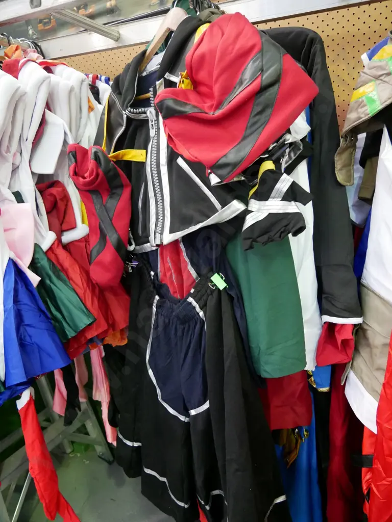 rack of assorted costumes Image 1++