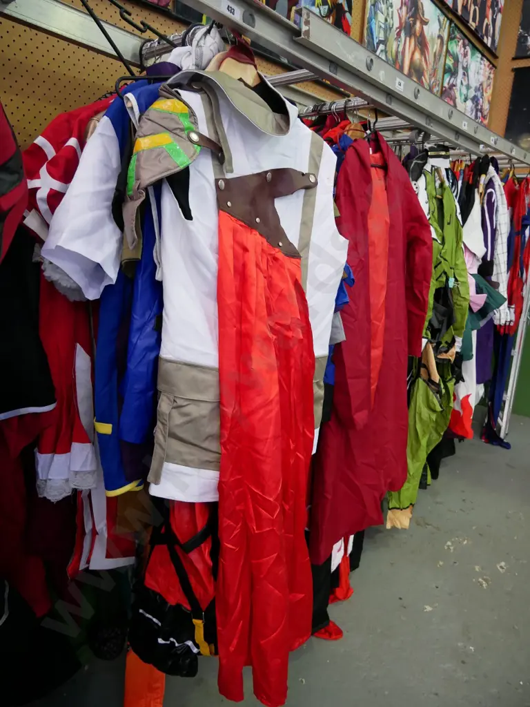 rack of assorted costumes Image 1++