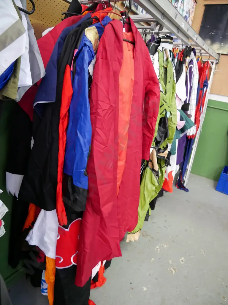 rack of assorted costumes Image 1++