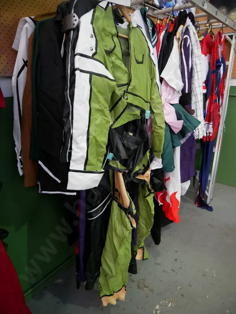 rack of assorted costumes Image 1++