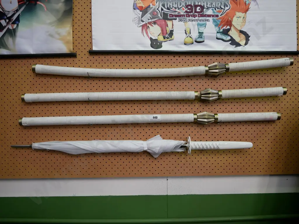 3 x fantasy swords and a sword handle umbrella Image 1++