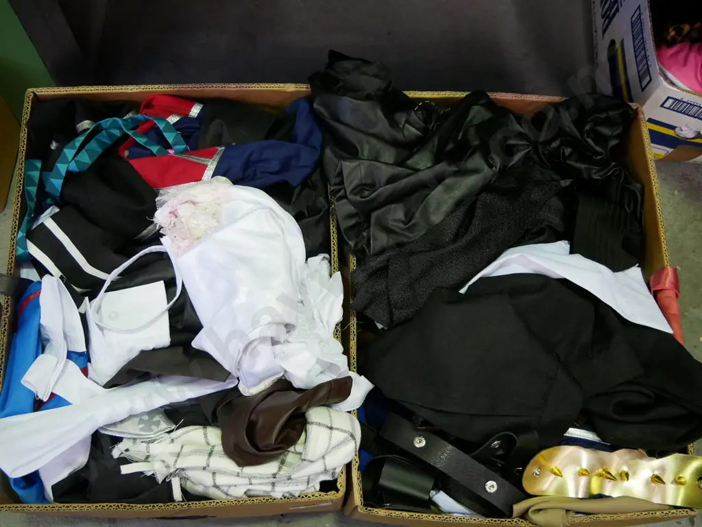 2 boxes of unopened costumes - orange dots Image 1++
