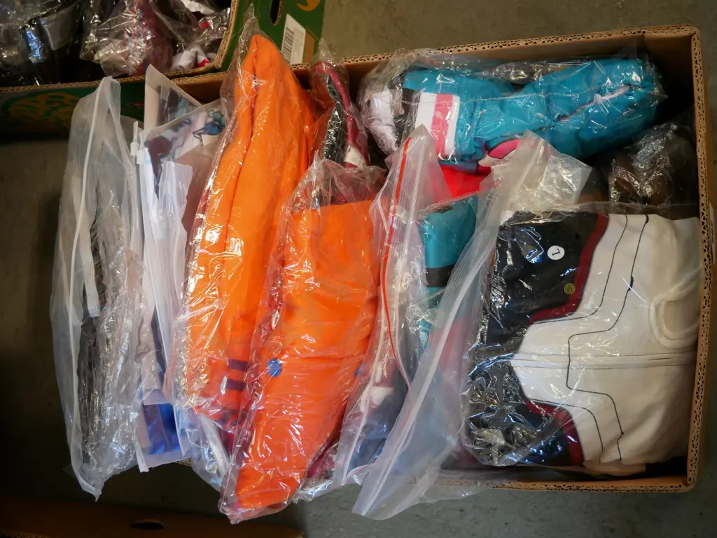 box of unopened costumes Image 1++