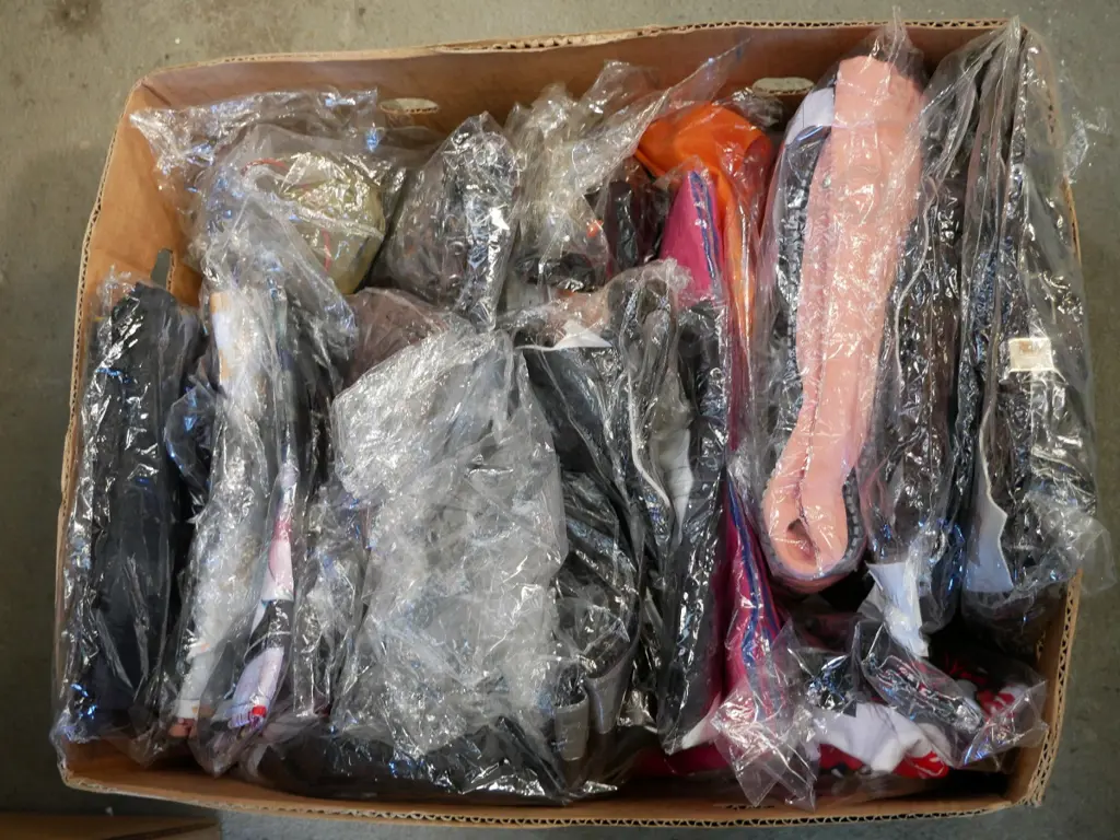 box of unopened costumes Image 1++