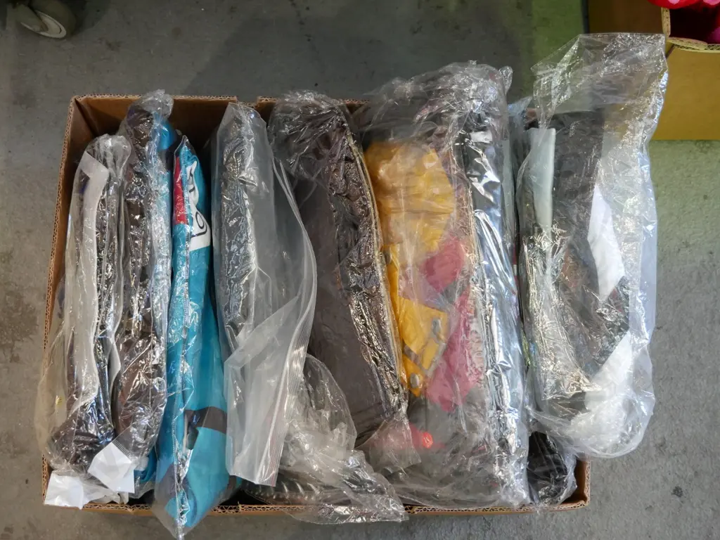 box of unopened costumes Image 1++