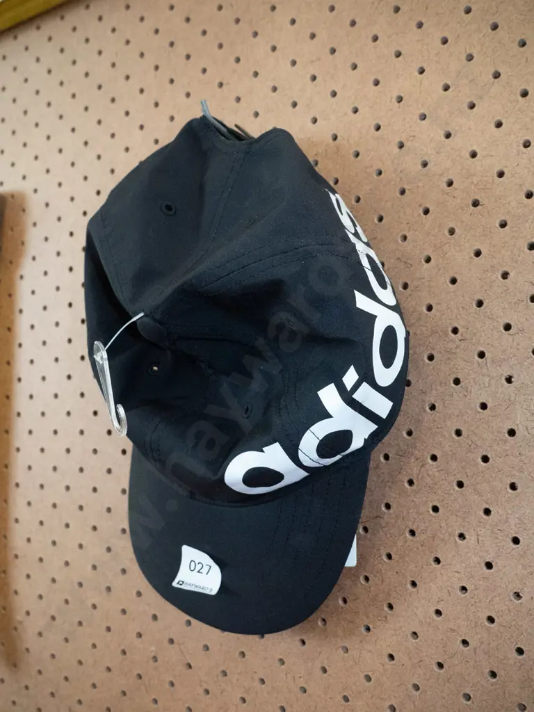 Black Adidas Baseball Cap with Rebel Sport sales label attached  Image 1++