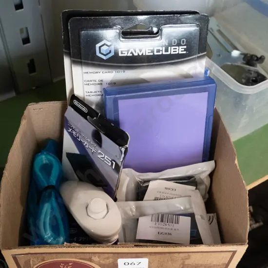 box  of 8 accessories used for gaming 