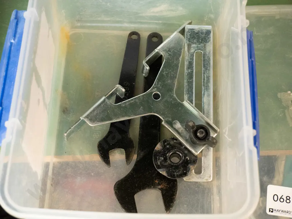 Clear plastic container with blue and contents Image 1++