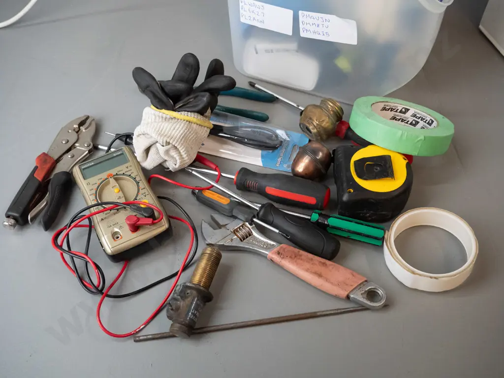 Box of various items, tapes, gloves, voltmeter etc Image 1++