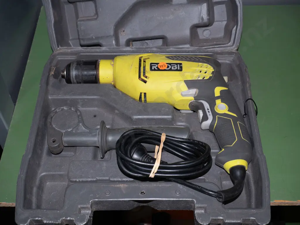 Ryobi corded drill - green - in grey carry case  Image 1++