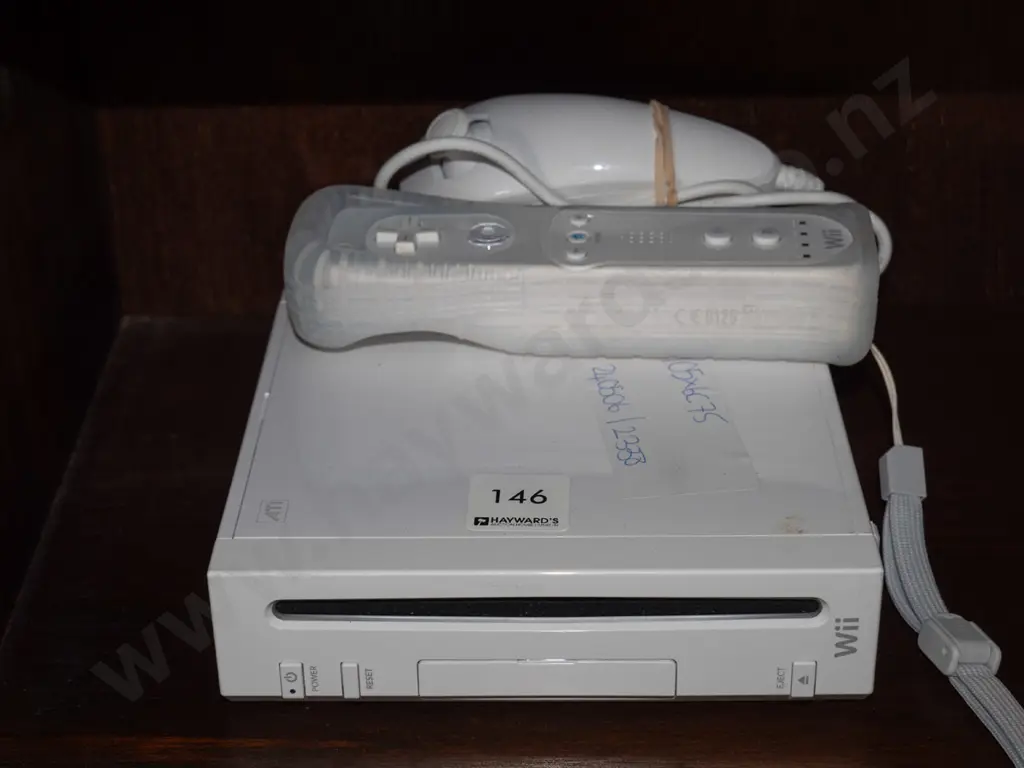 Wii Console and 2 controllers Image 1++