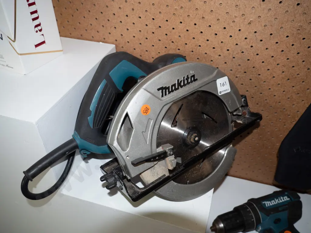 Makita corded skill saw - blue - model HS7000  Image 1++