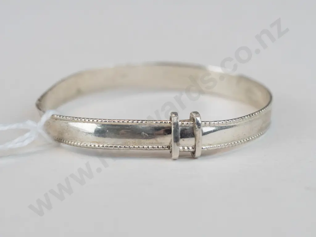 Silver child's bracelet with ""Ariana Grace"" engraved on front and ""05/12/23"" on the inside Image 1++