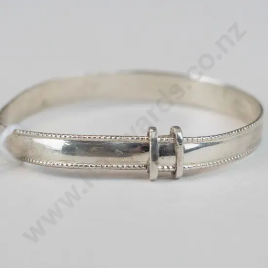 Silver child's bracelet with ""Ariana Grace"" engraved on front and ""05/12/23"" on the inside