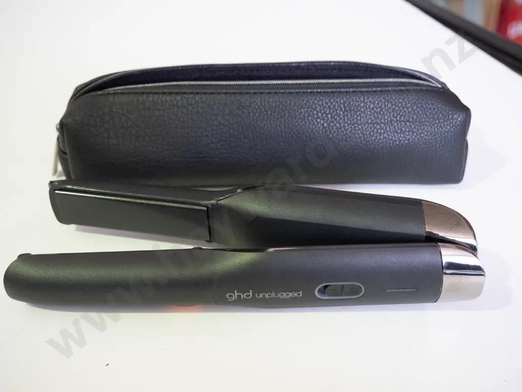 GHD cordless hair straightener in black bag  Image 1++