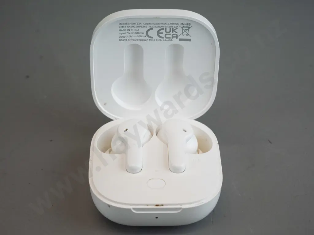 QCY ear buds in charging case Image 1++