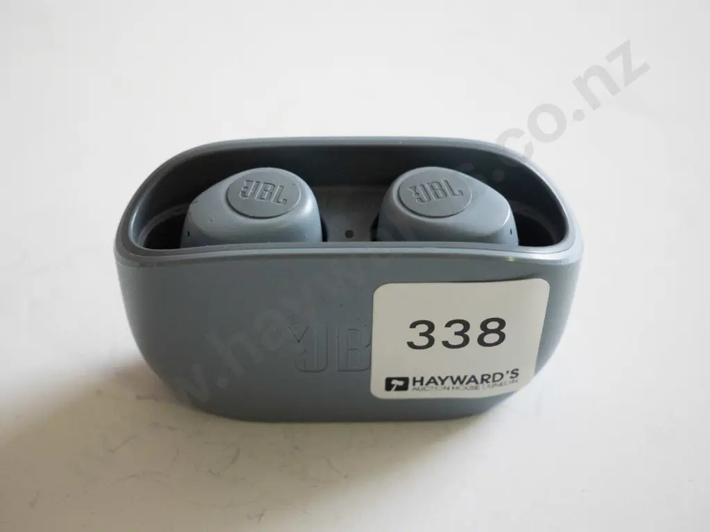 Pair of JBL ear buds in grey container Image 1++