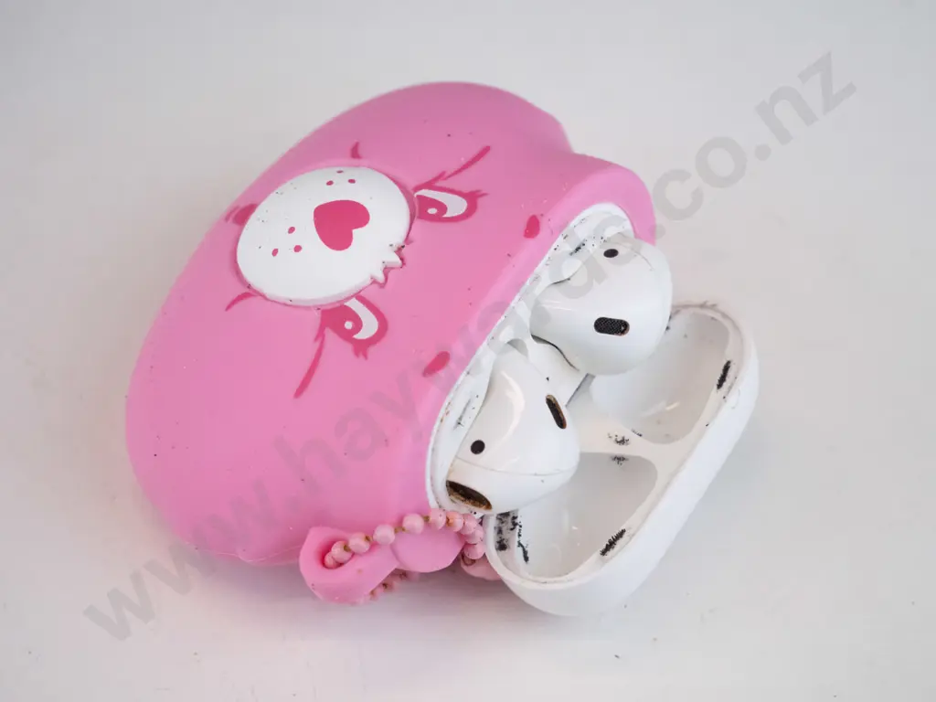 White Apple air buds in case with Pink rubbery cover Image 1++